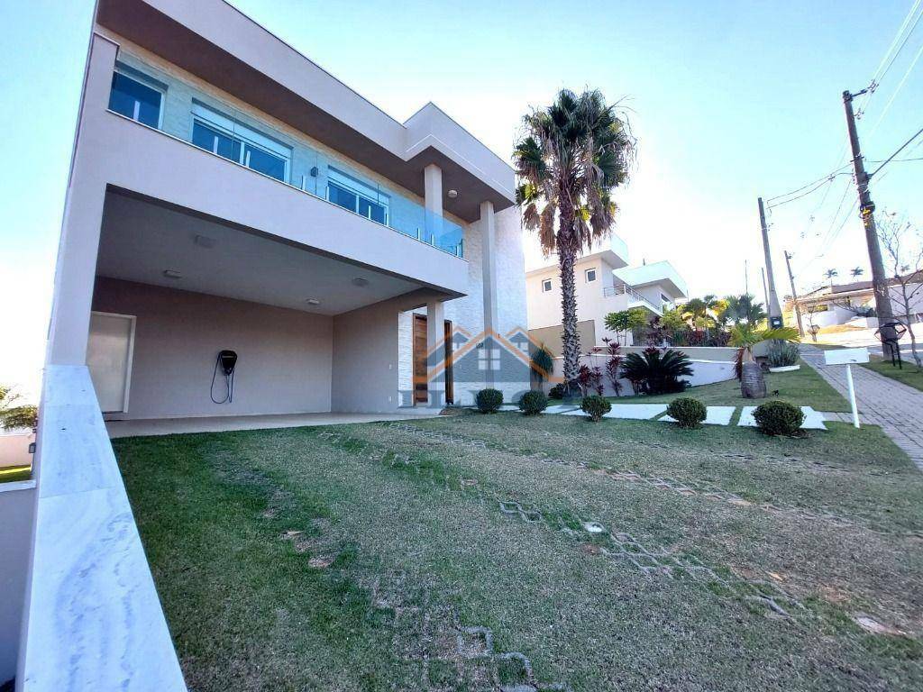 Casa de Condomínio à venda e aluguel com 4 quartos, 563m² - Foto 1