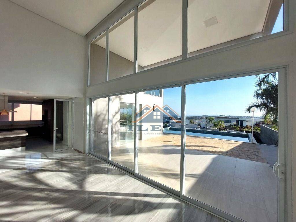 Casa de Condomínio à venda e aluguel com 4 quartos, 563m² - Foto 19