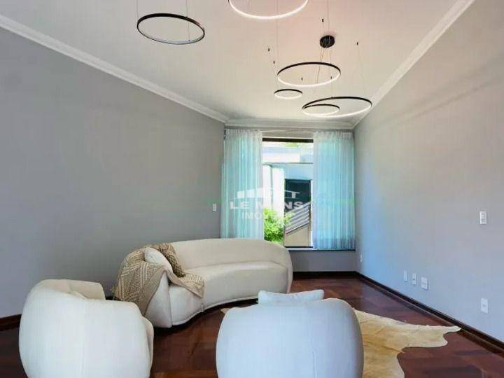 Casa à venda e aluguel com 5 quartos, 358m² - Foto 4